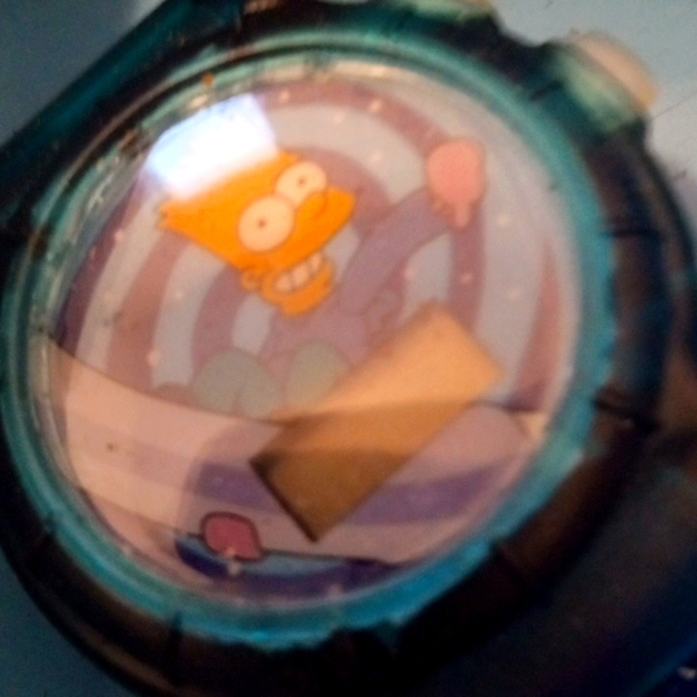 Simpson talking watches never used and rug rat